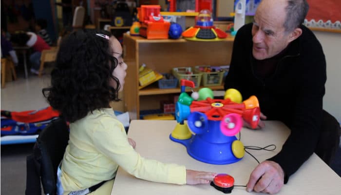 Photo of Steve Kanor with child