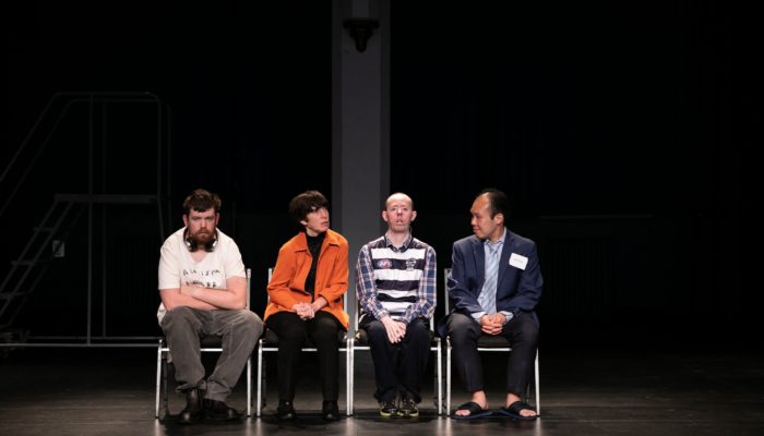 Four actors with disabilities on stage