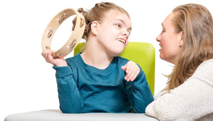 Girl with Disability and musical instrument