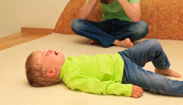 Child on floor crying